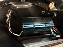 Load image into Gallery viewer, Aquatic AV 300 watt amplifier mounted on Havoc Roadlock saddlebag bracket for Road King