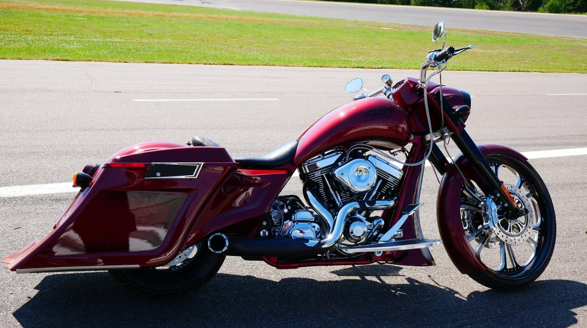 Red Havoc 124SS custom bagger motorcycle in side profile