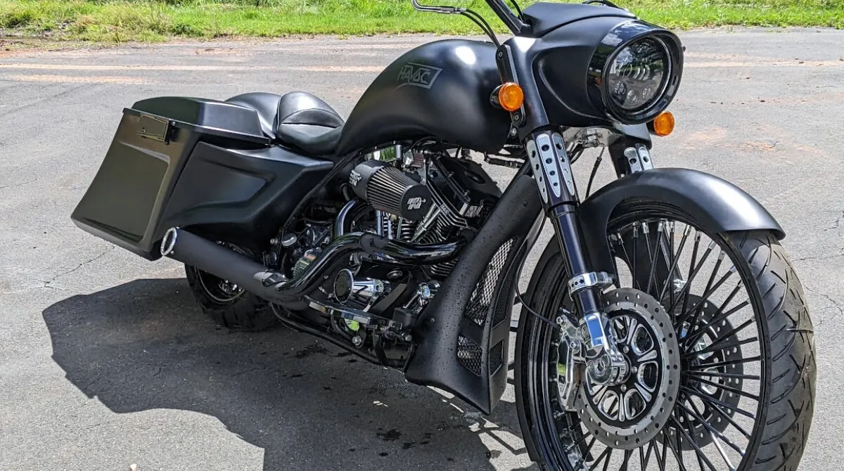 A big 26” front wheel on a Havoc motorcycle. The taller front wheel needs its own fender, and on a stock Harley, a raked front end (the Havoc uses a custom frame and raked tree).