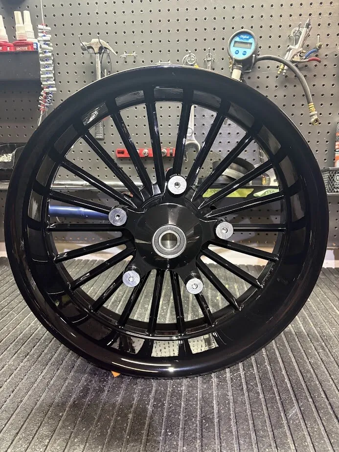 A Havoc wheel with its ABS bearing installed. Confirm which side the ABS bearing is on, and that its encoder faces out toward the sensor, before the tire is mounted.  Those are very often gold, or gray, as in this picture.